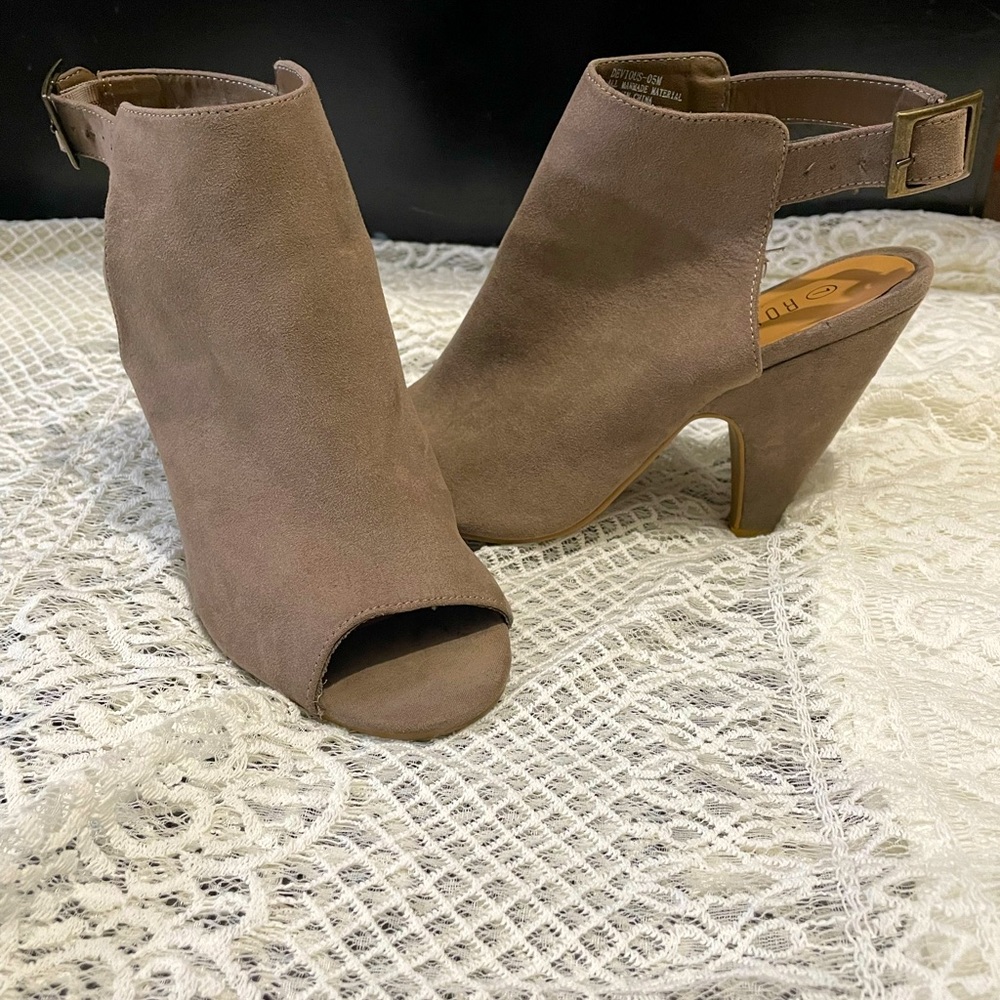 Open toe sling back heels.